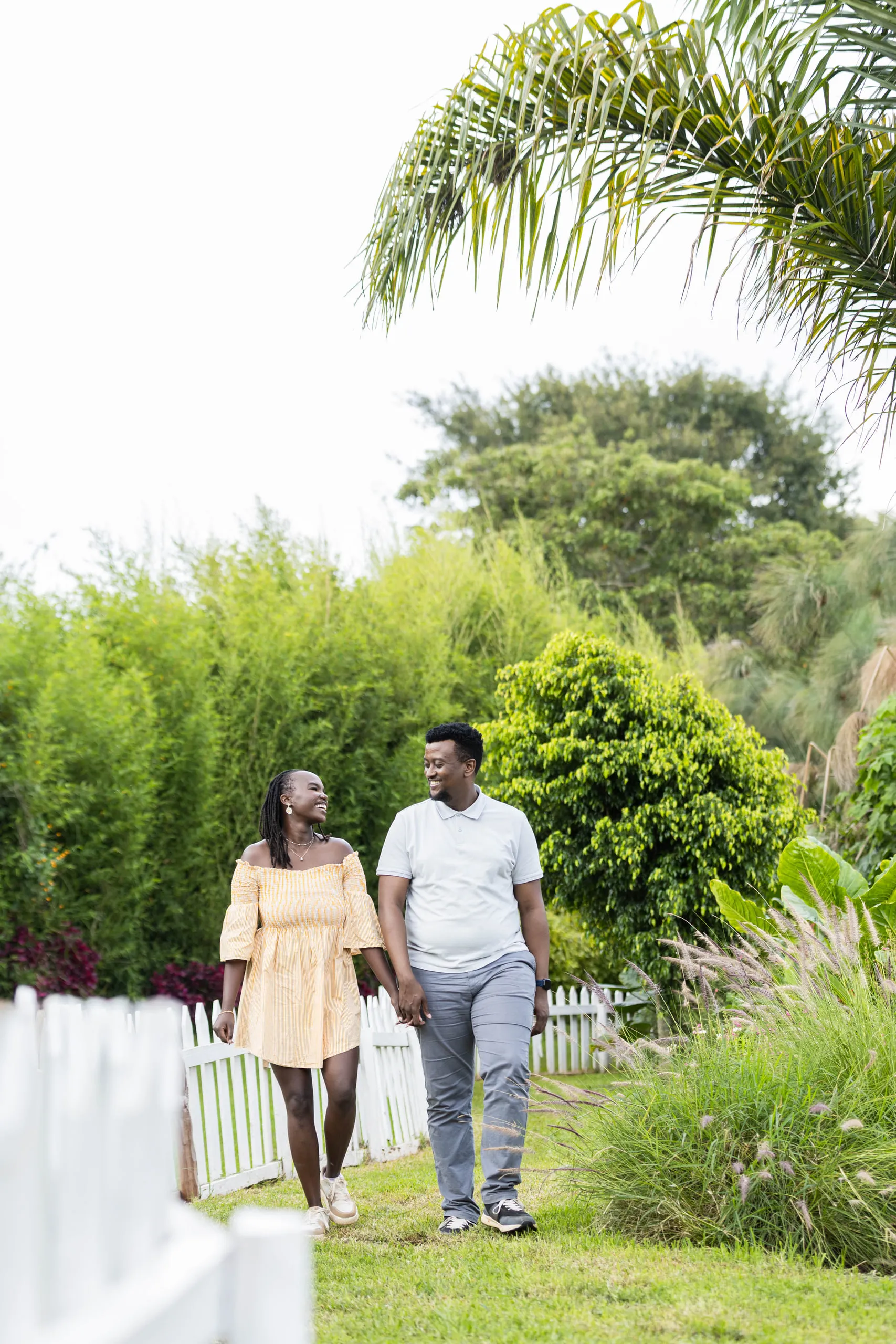 Couple walking a garden path together
